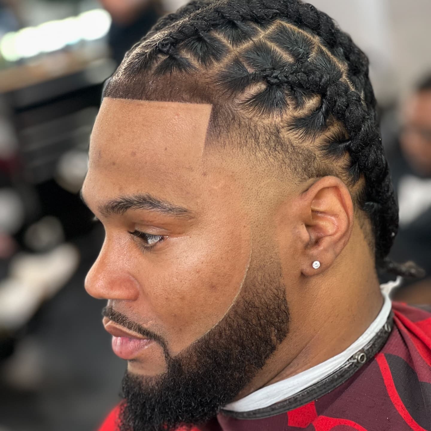 Precision bald fade with braided top