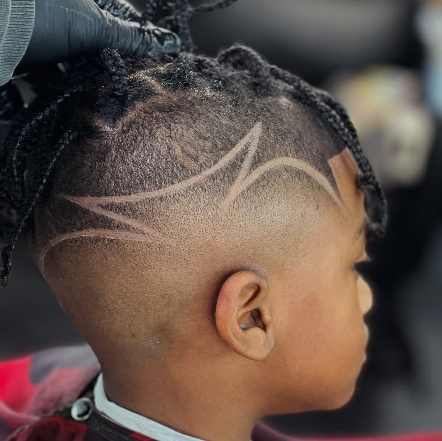 Kids cut with braids and geometric design